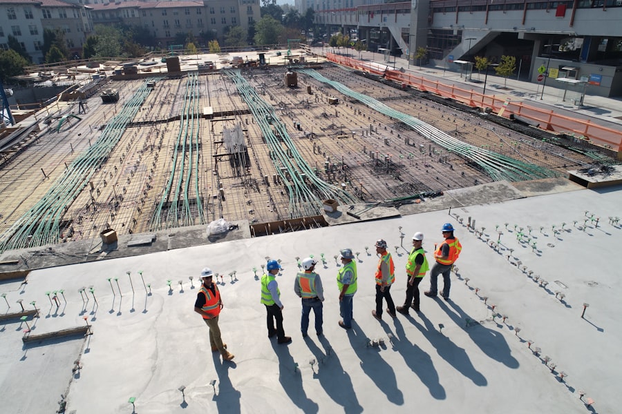 Construction team reviewing plans on site